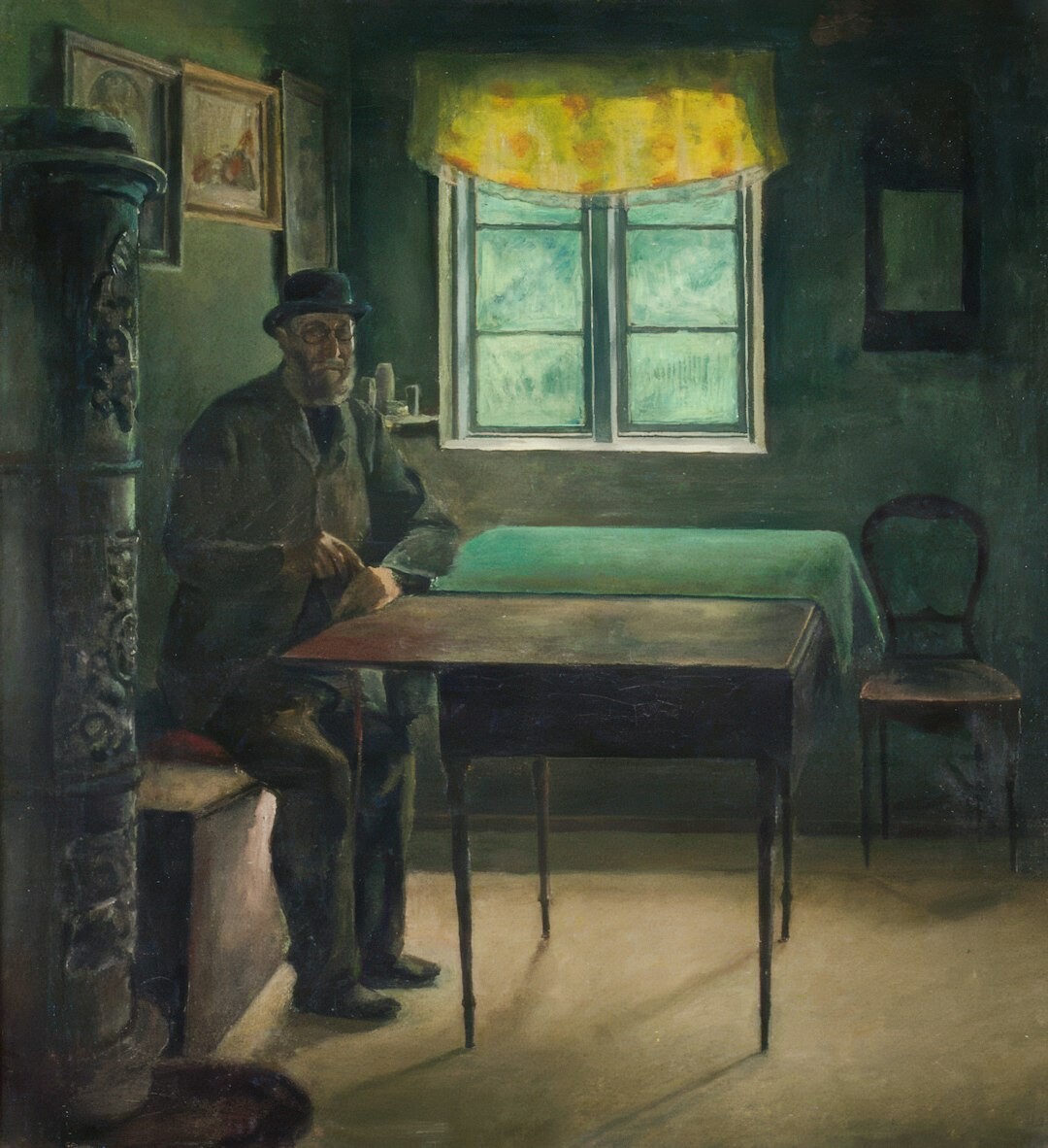 Studio portrait of a French man writer with glasses and light stubble